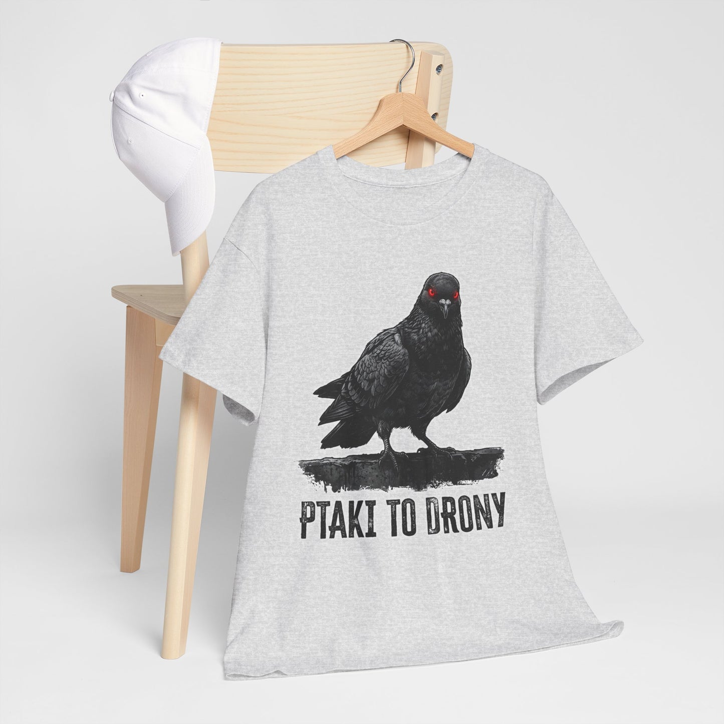 Ptaki To Drony - spiskowy gołąb z czerwonym okiem